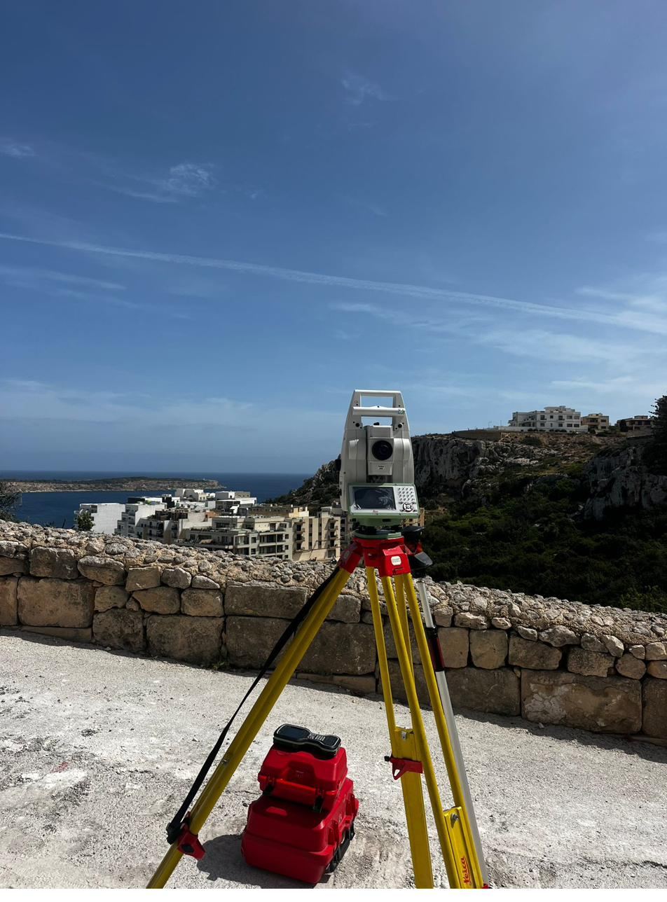 Total station survey overlooking the Maltese coast